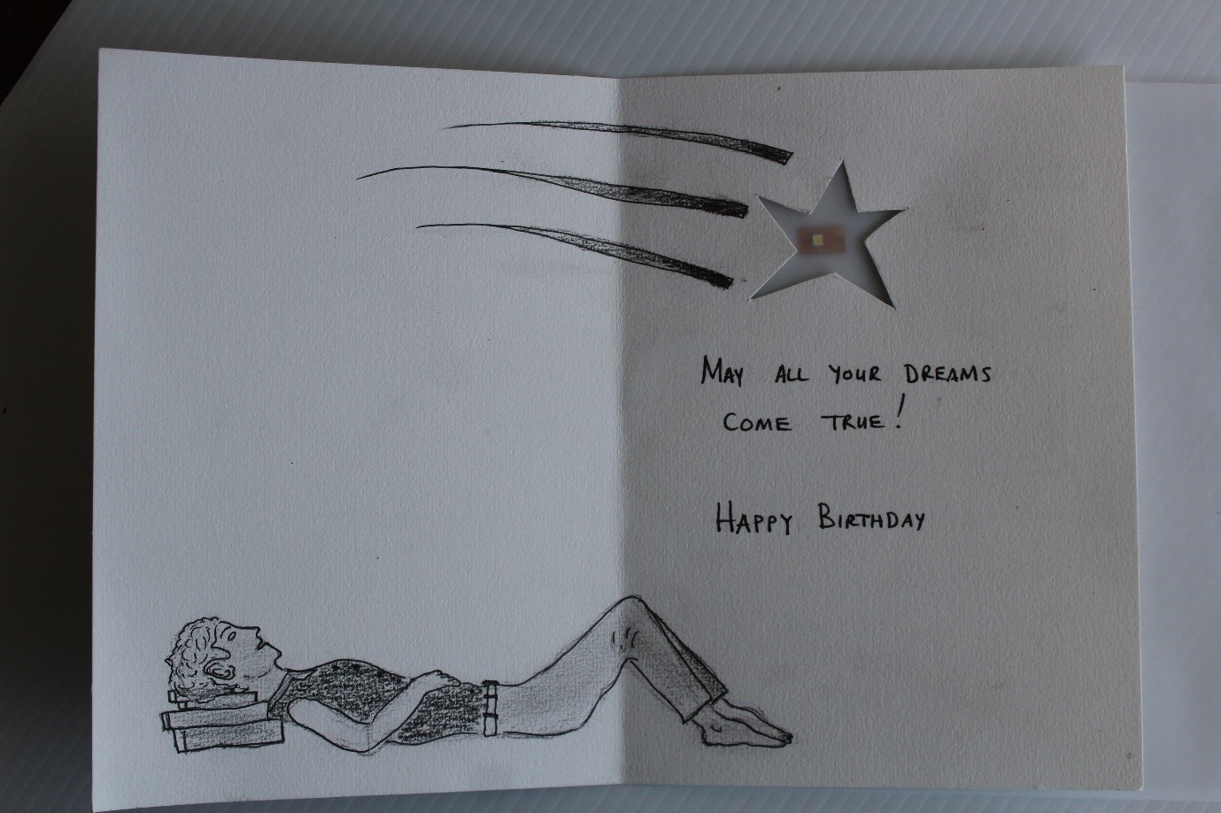 IMAGE: Greeting card with flashing star. Greyscale (pencil & ink pens). Credit: W Van Zyl