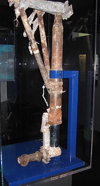 A piece of the landing gear of Saint-Exupéry’s P-38 Lightning, recovered from the Mediterranean off France’s coast in 2003, displayed at the French Air and Space Museum. Credit: Harry Zilber - Own work, CC BY-SA 4.0, https://commons.wikimedia.org/w/index.php?curid=16190429